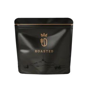 zrnková káva černý sáček ROASTED zlaté logo nahoře